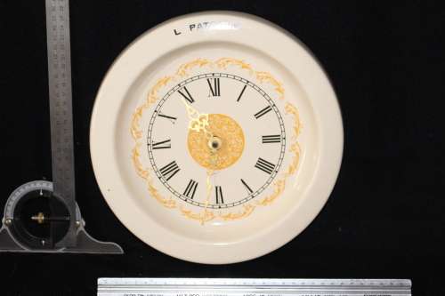 Vintage 1942 custom porcelain wall clock Dated on back
