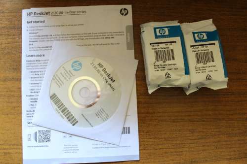 New & Unused HP Deskjet 2130 Printer,scanner & Copier. Includes brand new unopened ink set.