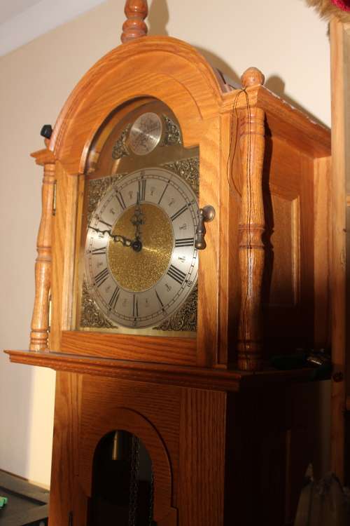 Stunning 2 metre solid Rhodesian Oak Grandfather clock 5 day movement(chimes need servicing)