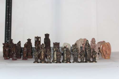 AMAZING LOT! 39 CHESS PIECES INCL. HAND CARVED WOODEN CHINESE, HANDCARVED STONE & VINTAGE CAST METAL