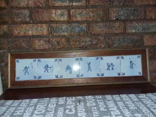 A MAGNIFICENT FRAMED COLLECTION OF SIX ANTIQUE (c1900's) HAND PAINTED DELFT PORCELAIN TILES