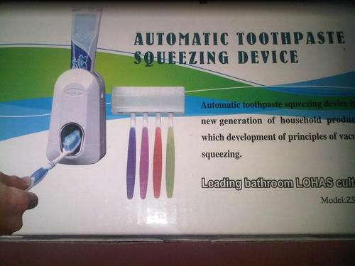 Automatic toothpaste squeezing device.