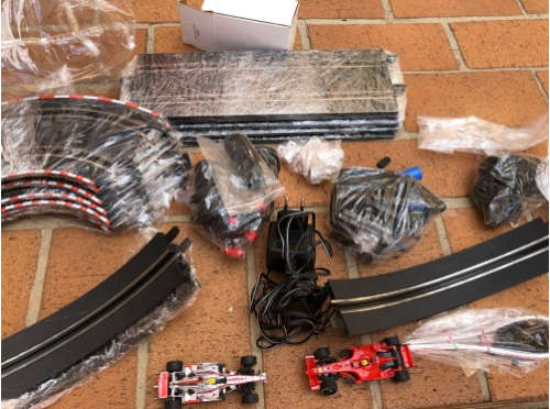 Lovely Carerra slot car set - track, cars and charger