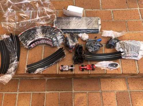 Lovely Carerra slot car set - track, cars and charger