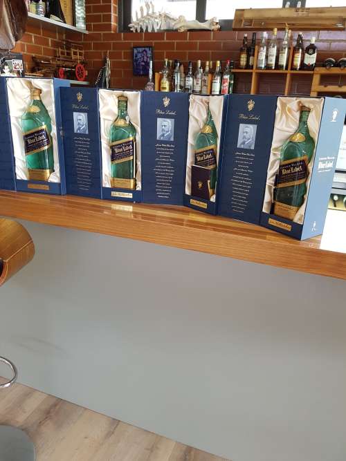 EMPTY JOHNNY WALKER BLUE BOTTLES IN ORIGINAL PACKAGING