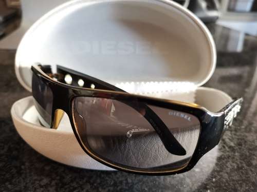 # DIESEL DS 0009 - DIESEL # FREE ORIGINAL DIESEL POUCH  & CLOTH #