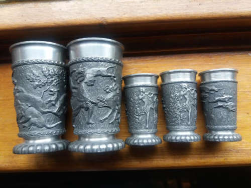 " RENZINN " FROM GERMANY 4 x TIN DRINKING CUPS WITH HUNTING SCENE 9cm TALL AND 3 x TIN CUPS 6cm TALL