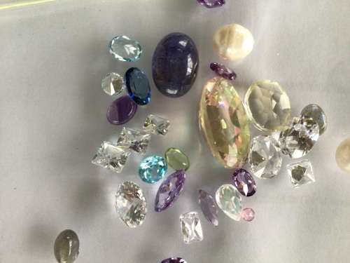 JOB LOT 3,+_50.00 cts  of GEMS, TOPAZ, PERIDOT, CZ, AMATHYST, TANZANITE. PEARLS . BID PER CARAT.