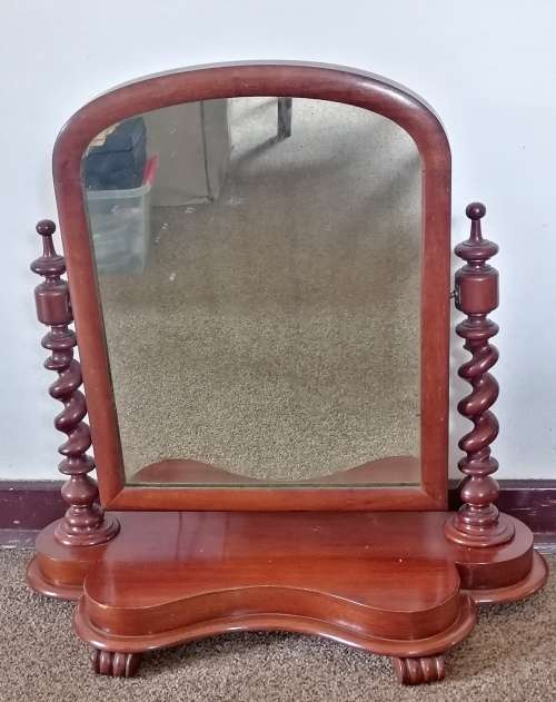 A Devine mahogany shaving or toilet mirror