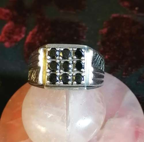 A stunning 925 silver and black stones men's ring