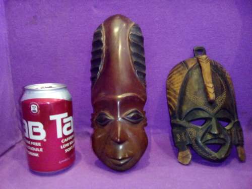 2 old hand carved African masks
