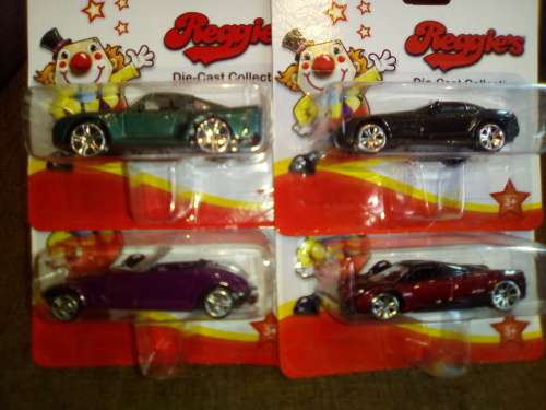 4 Assorted Die-cast metal Motormax cars 1:72