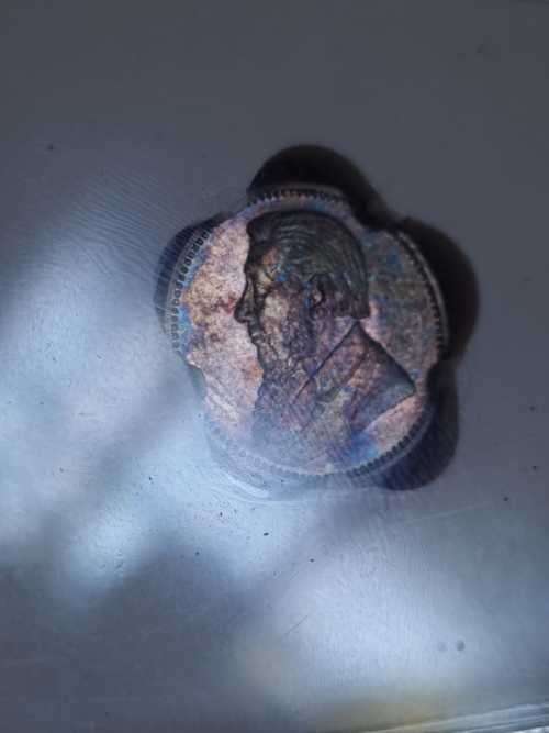 Beautiful, rainbow toned 1897 MS63 6d