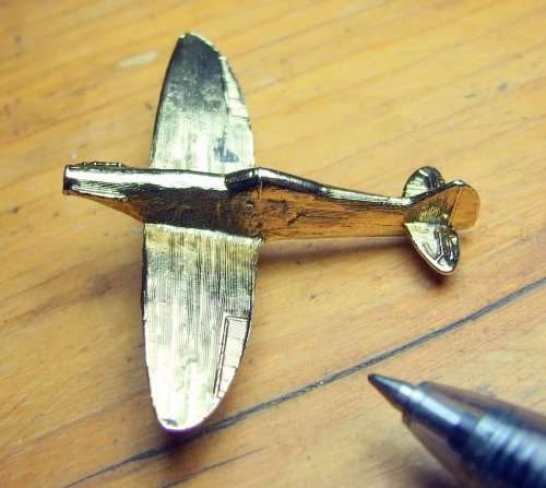 Bright, shining WW2  "Spitfire" airplane brooch, good condition.