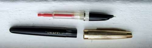 Vintage unbranded piston fill fountain pen, un-inked, advertising UNIAFEL (United Africa Electric)