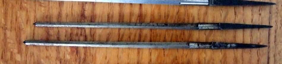 A large collection of assorted engraving tools