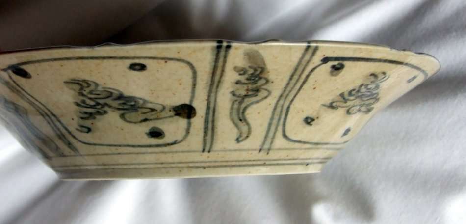 A hand painted Chinese ceramic bowl with standing immortal figure