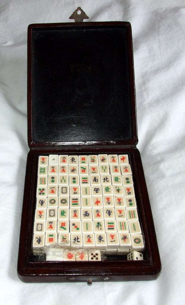 A delightful  boxed Mahjong set with 144 tiles and dice