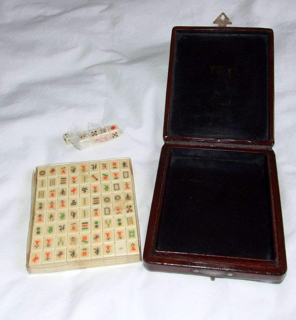 A delightful  boxed Mahjong set with 144 tiles and dice