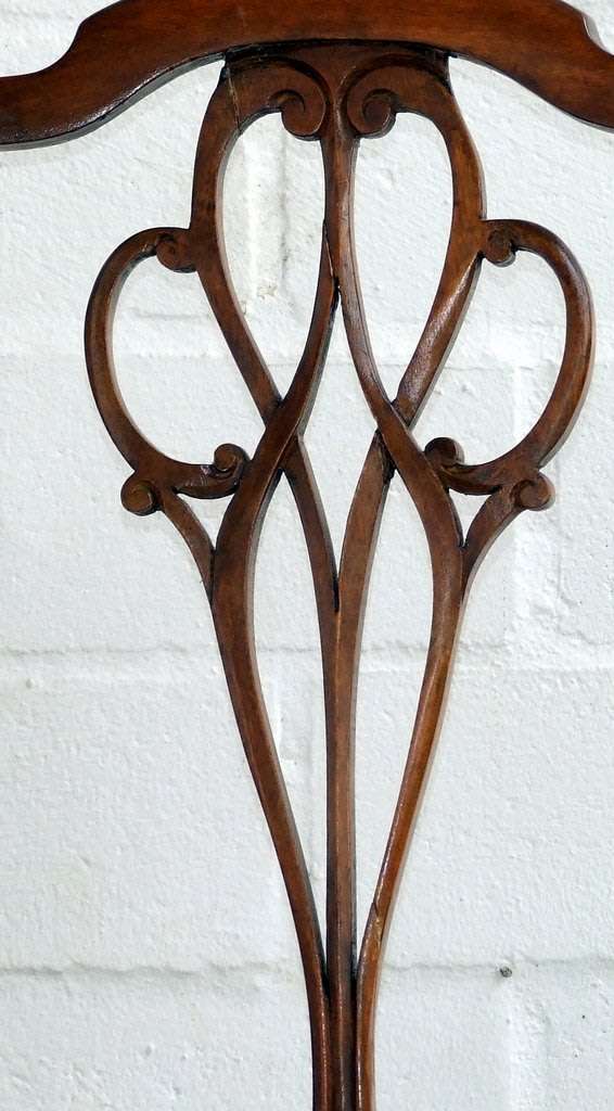 Antique Elbow (Carver) Chair in sturdy condition, fretwork damaged, probably Walnut.