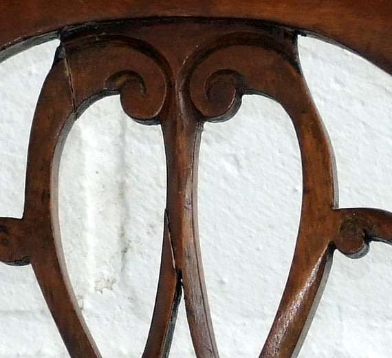 Antique Elbow (Carver) Chair in sturdy condition, fretwork damaged, probably Walnut.