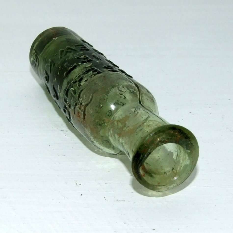 Antique Glass Bottle: "ELIXIR OF LONG LIFE"