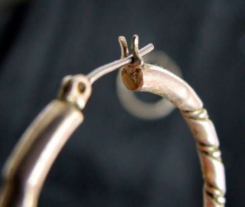 Classic vintage silver loop earrings.