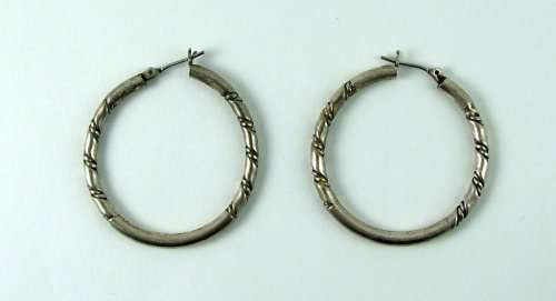 Classic vintage silver loop earrings.