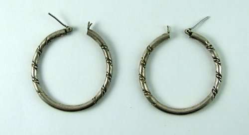 Classic vintage silver loop earrings.
