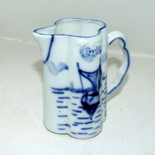 Antique Blue and White Embossed  Milk Jug with Dutch Barge and Mark