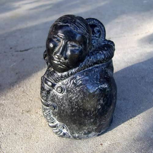 Vintage carved Inuit Mother and Child sculpture, signed `W.E.`