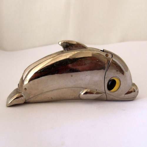 Unusual, hefty (83grams) Piezo Jet dolphin lighter, working.