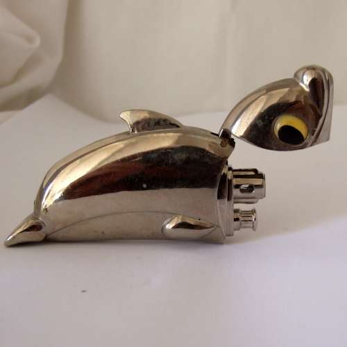 Unusual, hefty (83grams) Piezo Jet dolphin lighter, working.