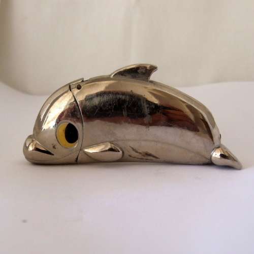 Unusual, hefty (83grams) Piezo Jet dolphin lighter, working.