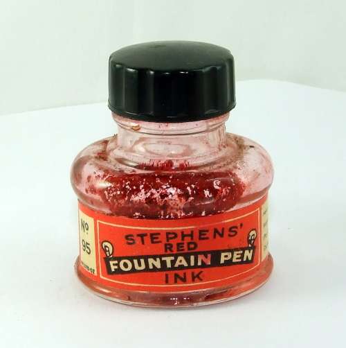 Antique STEPHENS` red fountain pen ink bottle.