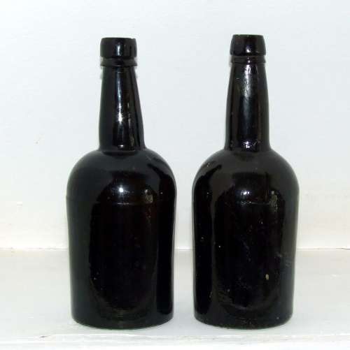 Antique black glass  bottles