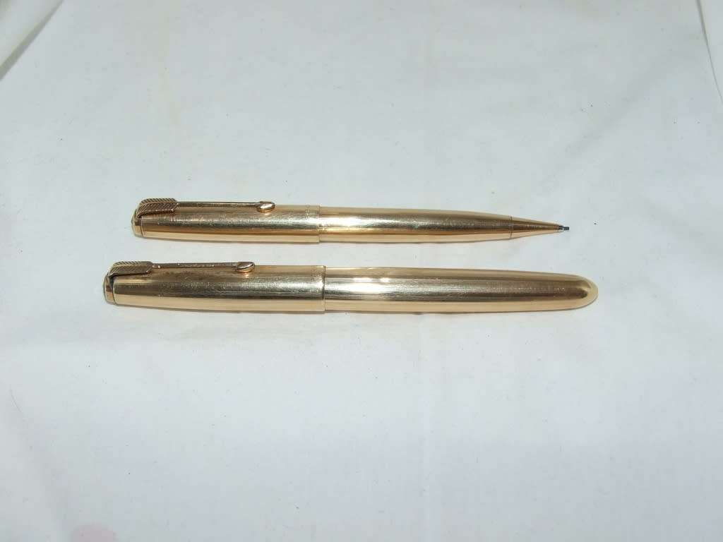 Boxed 14k gold filled Parker 51 fountain pen and pencil set, working.