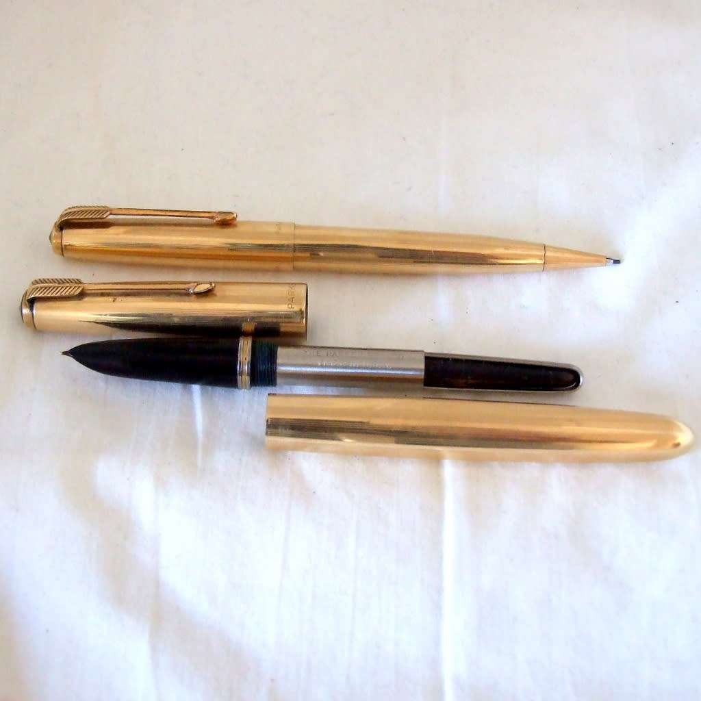 Boxed 14k gold filled Parker 51 fountain pen and pencil set, working.
