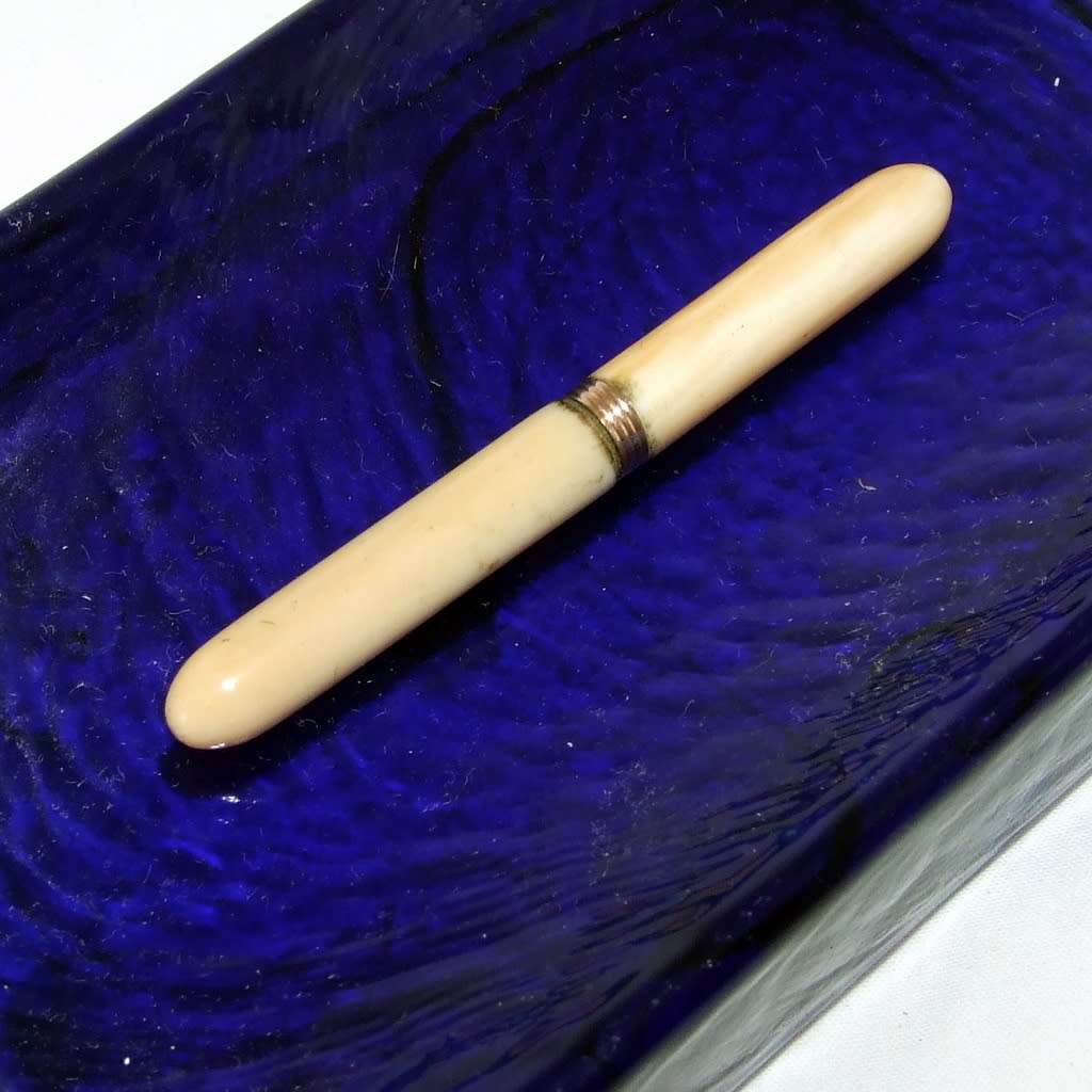 Antique bone and rolled gold pocket toothpick