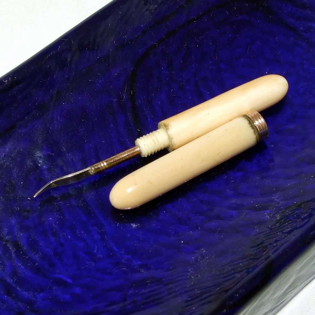 Antique bone and rolled gold pocket toothpick