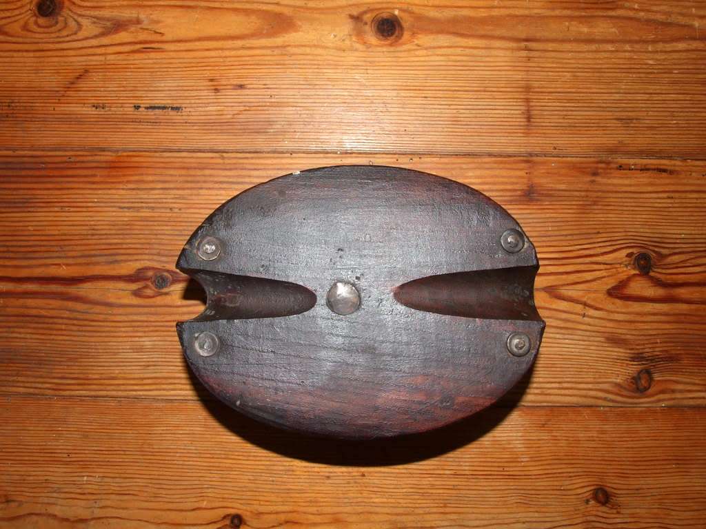 A vintage wood sailing block pulley