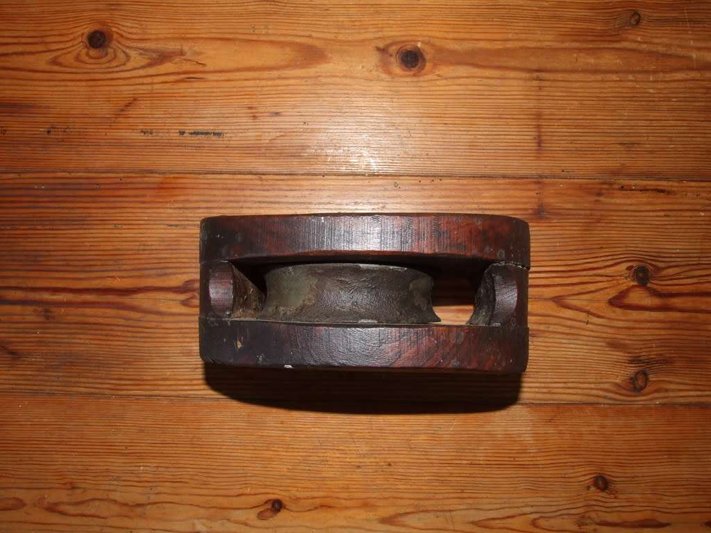 A vintage wood sailing block pulley