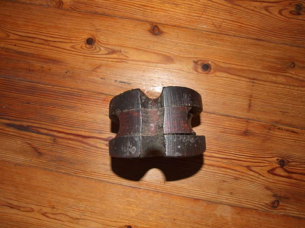 A vintage wood sailing block pulley