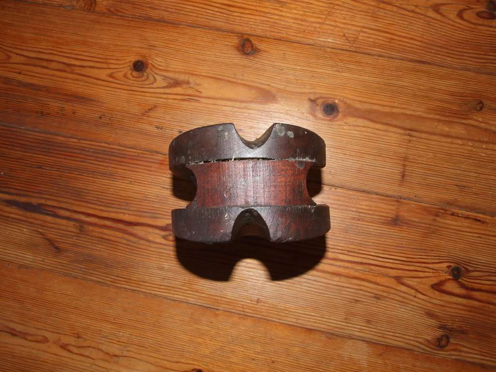 A vintage wood sailing block pulley