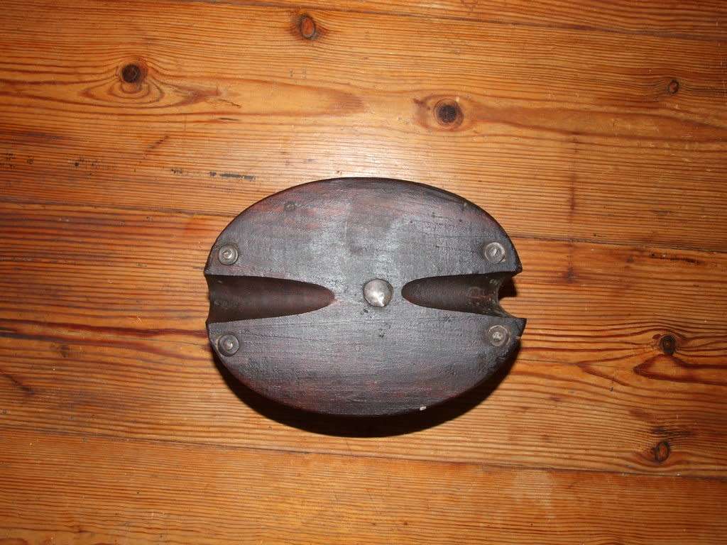 A vintage wood sailing block pulley