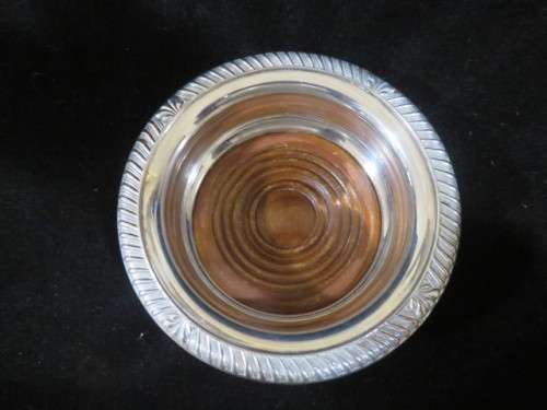 Antique silver plate and wood wine bottle coaster.
