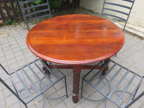 4 heavy wrought iron chairs.