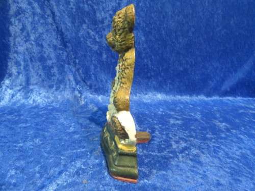 Wright Studio cast iron door stop.