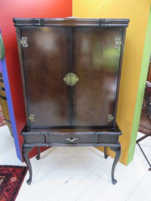 Dark wood drinks cabinet