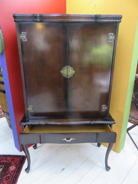 Dark wood drinks cabinet